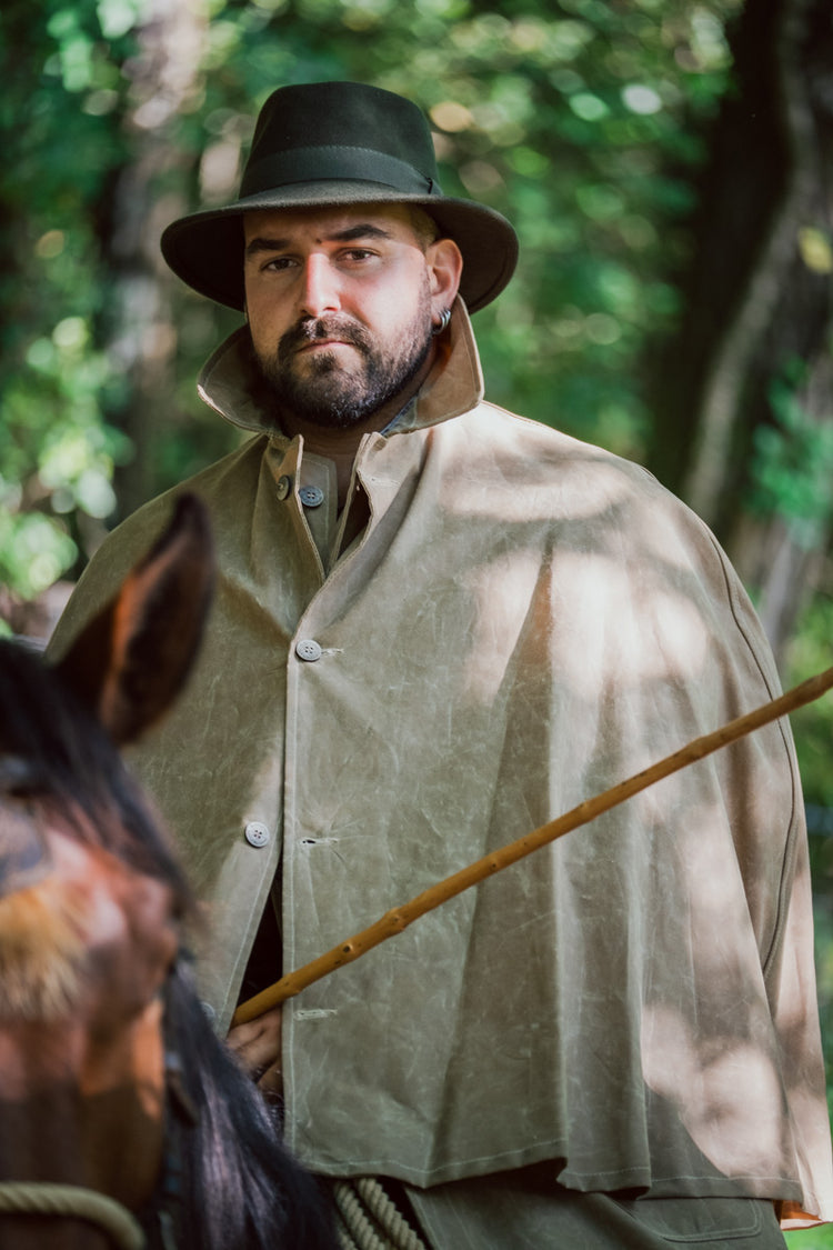 Mantella lunga in cotone cerato
